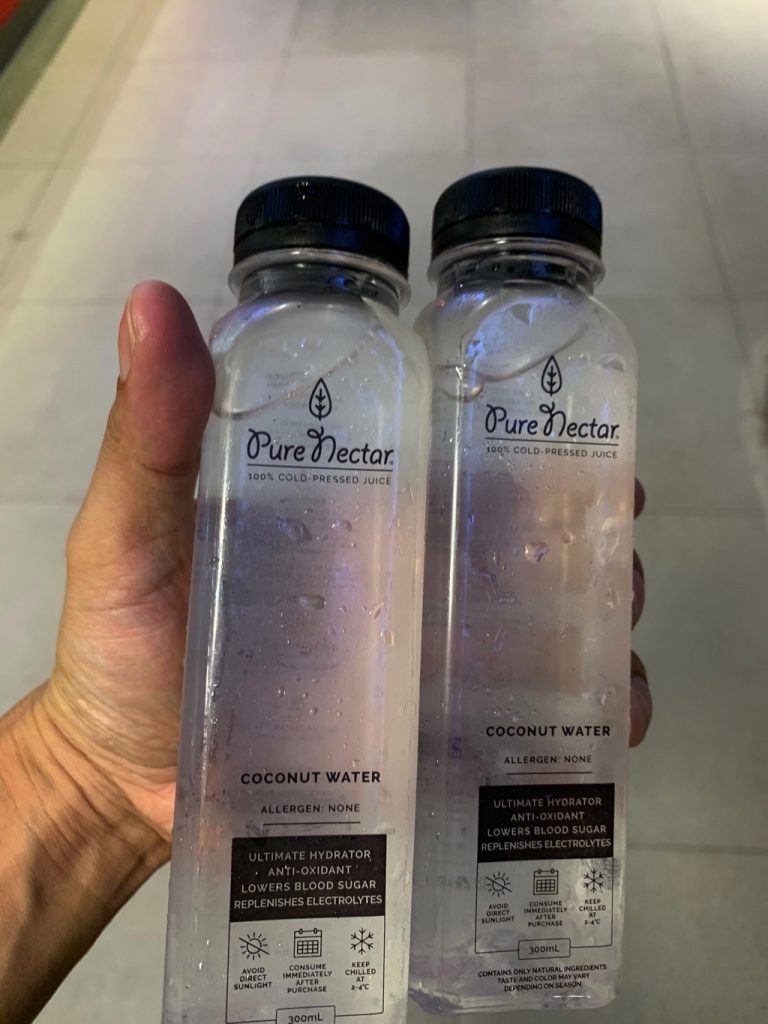 living in Manila Pure Nectar coconut water, food district on 5th BGC