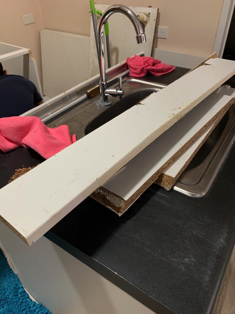 kitchen remodel update; old sink and old base cabinet