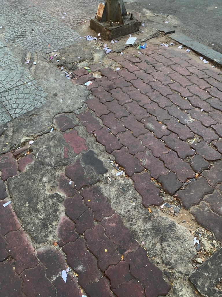 early FI destination Ho Chi Minh City trash on streets